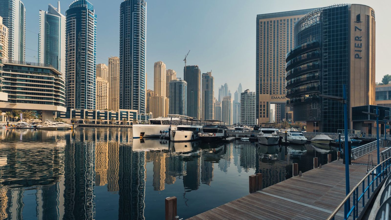Dubai Marina skyline with towers and yachts